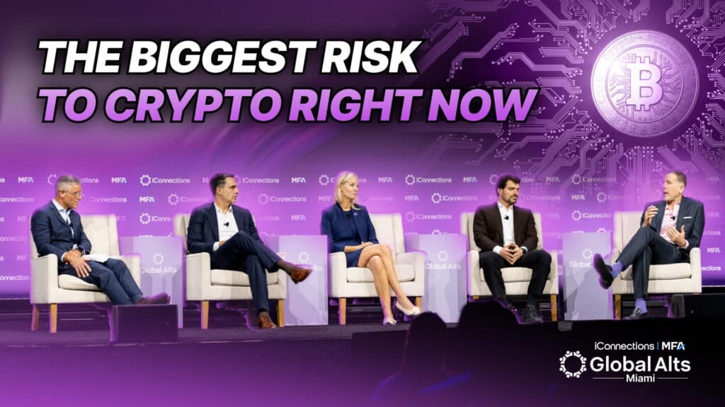 YouTube thumbnail for "Bitcoin Peaked the Same Day Software Peaked — Why AI Is the Biggest Risk to Crypto Right Now," showing five panelists seated on stage at Global Alts Miami 2026 in light gray armchairs against a purple backdrop featuring circuit-board imagery and a large Bitcoin logo on the right, with bold white-and-purple overlay text reading "THE BIGGEST RISK TO CRYPTO RIGHT NOW.